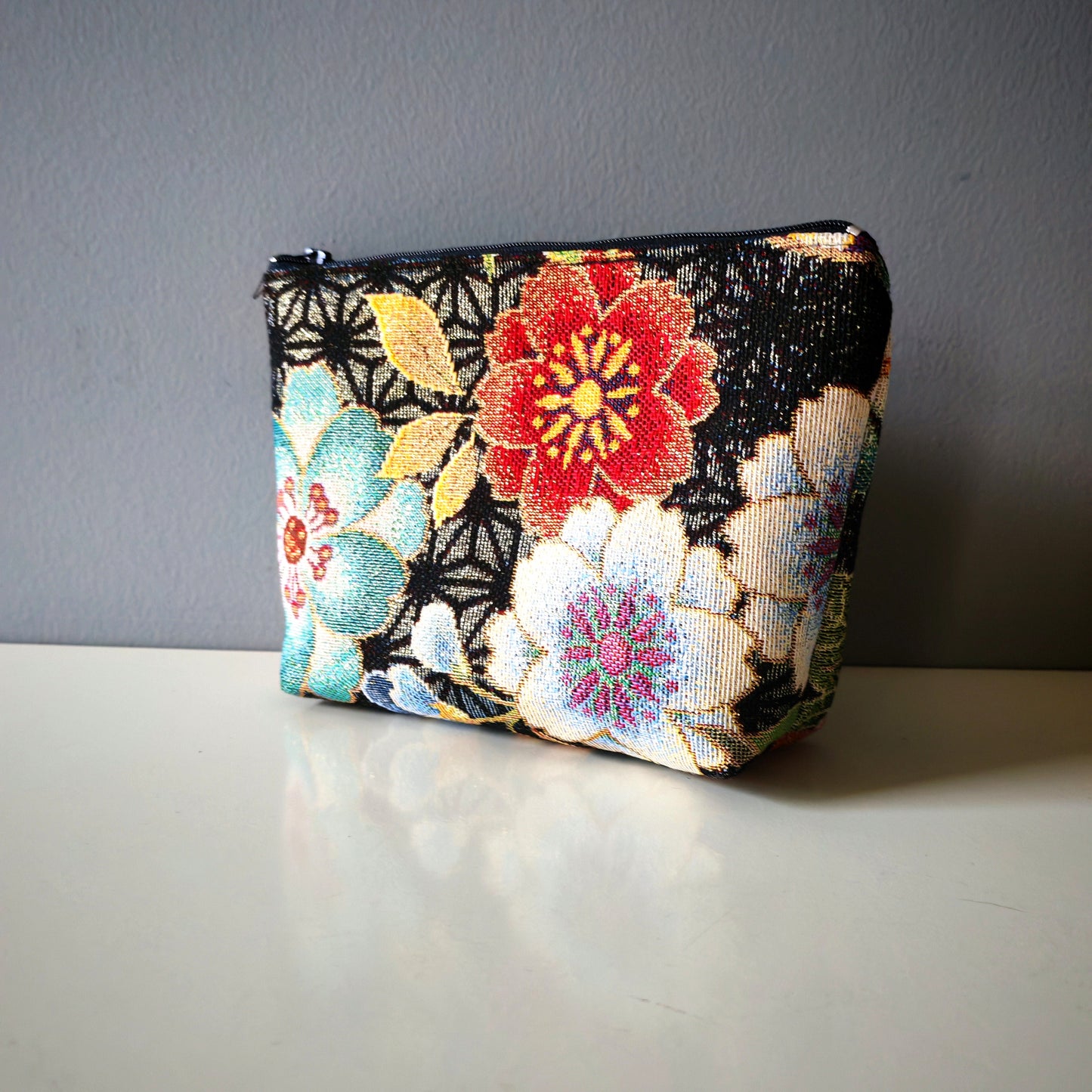 Trousse maquillage fleurs or
