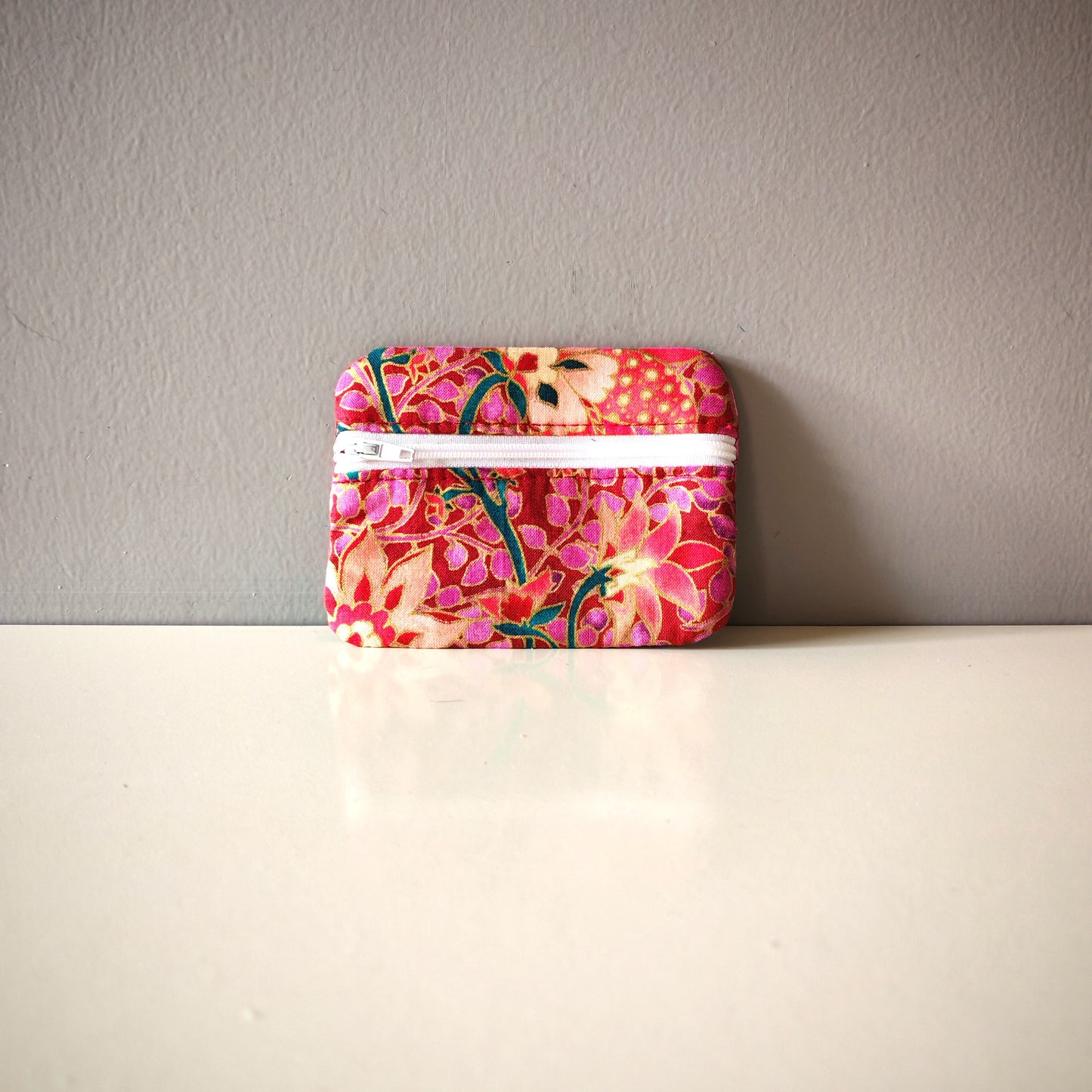 Les porte-monnaies zip avant