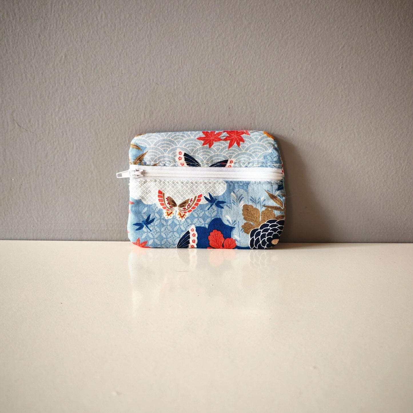 Les porte-monnaies zip avant