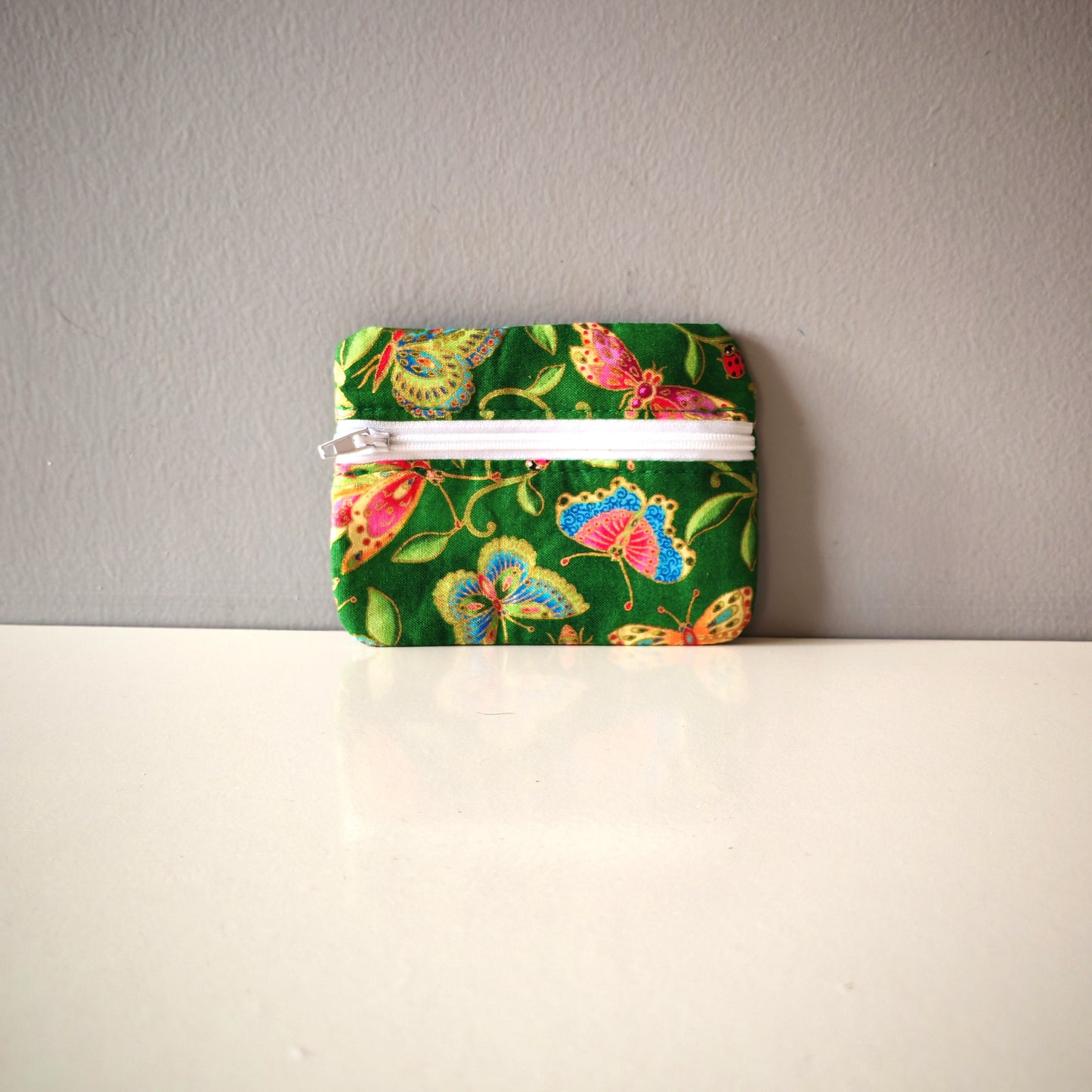 Les porte-monnaies zip avant