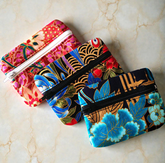 Les porte-monnaies zip avant