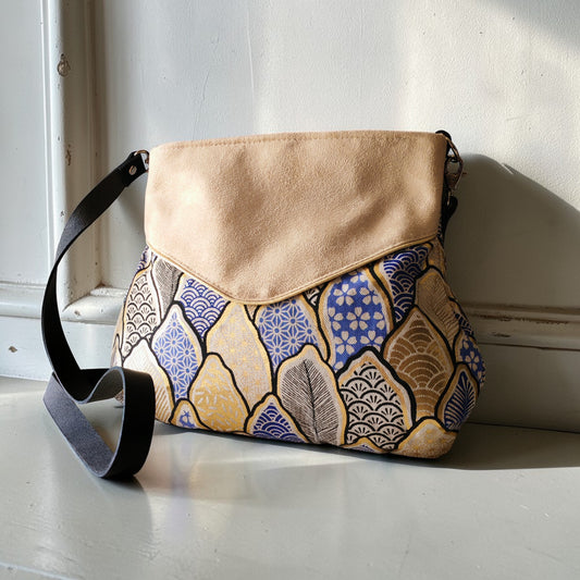 Sac Poire beige et or, feuilles bleues